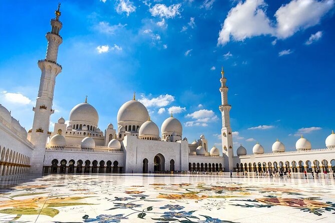 Shared Full Day Guided Tour Visit to Abu Dhabi - Corniche, Etihad Towers, Qasr Al Watan, and Royal Palace Area Drive Passes