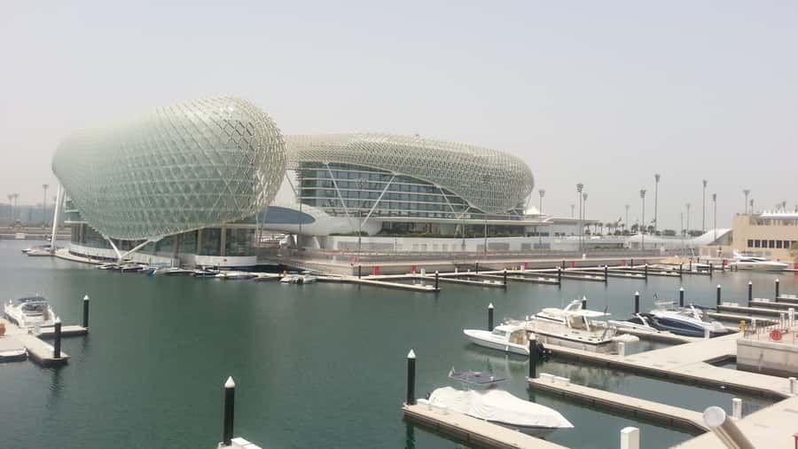 Sport and Luxury in Abu Dhabi: 1-Day Tour from Abu Dhabi - Sheikh Zayed Grand Mosque: awe plus clear dress rules