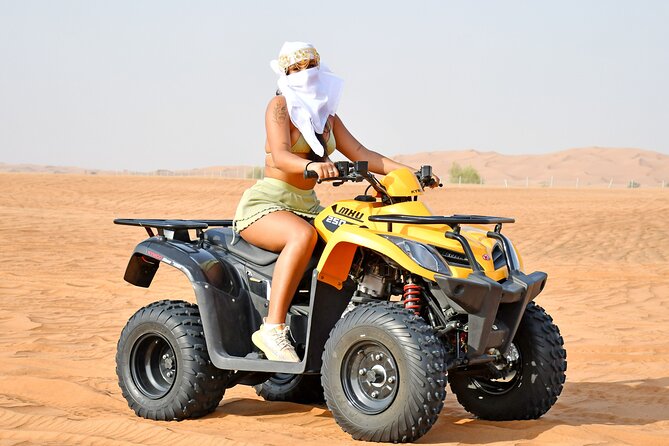 Sunset Desert Safari Quad bike Camel ride Sand Board & BBQ Dinner - Sheesha, Shows, and How to Keep the Evening Comfortable