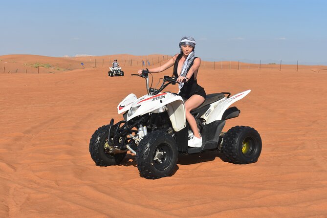 Sunset Desert Safari Quad bike Camel ride Sand Board & BBQ Dinner - Dune Bashing and Sandboarding: The Fun, the Safety Feel, and What to Expect