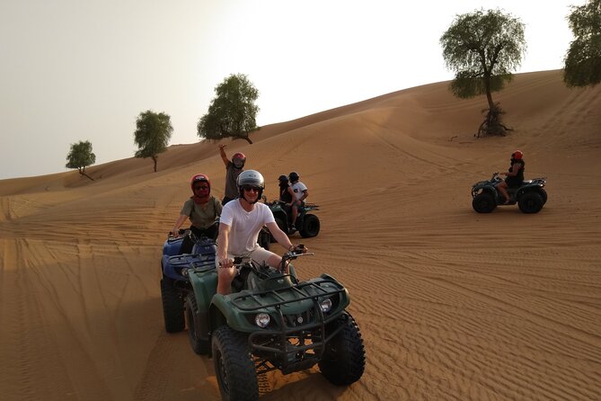 Sunset Quad/Buggy Tour & BBQ Evening - Sandboarding on Red Dunes, Plus a Camel Ride Break