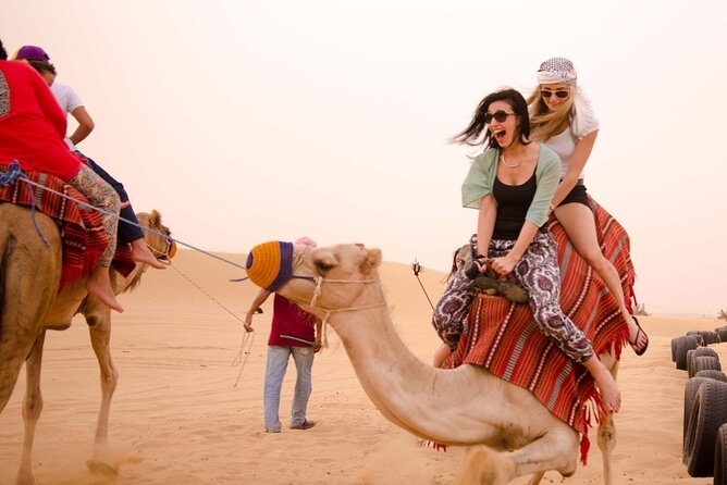 Thrilling Desert Safari Dubai Adventure with Sand Boarding and Barbecue Dinner - The Sunset Photo Stop: Why This One Moment Is So Popular