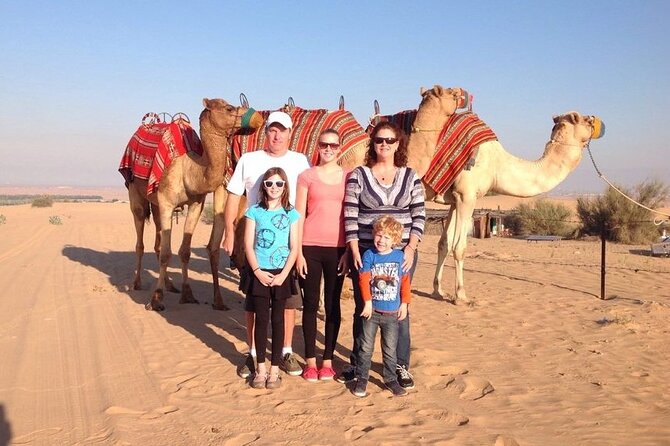 Thrilling Desert Safari Dubai Adventure with Sand Boarding and Barbecue Dinner - Live Entertainment in the Camp: Belly Dance, Tounora Dance, and Fire Show
